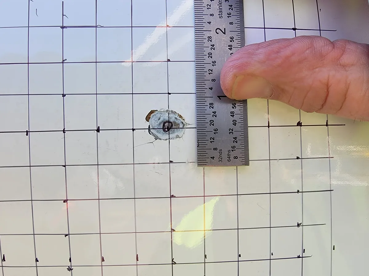 Skin dent mapped on a grid and measured